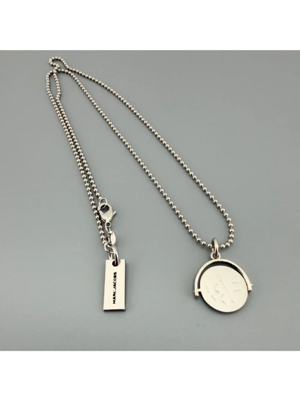 Marc Jacobs Spinner Pendant Charm Necklace P.S. I Love You Message Silver Tone